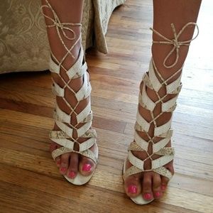 Snakeskin print lace-up heels